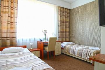 Фото номера Двухместный номер с 2 отдельными кроватями Отель Hotel &amp; SPA Odeon г. Boguchwała 7