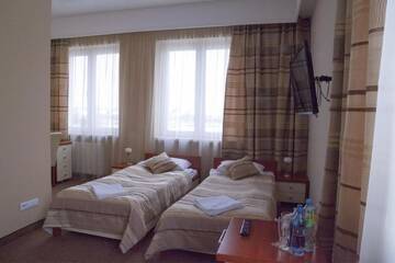 Фото номера Двухместный номер с 2 отдельными кроватями Отель Hotel &amp; SPA Odeon г. Boguchwała 11