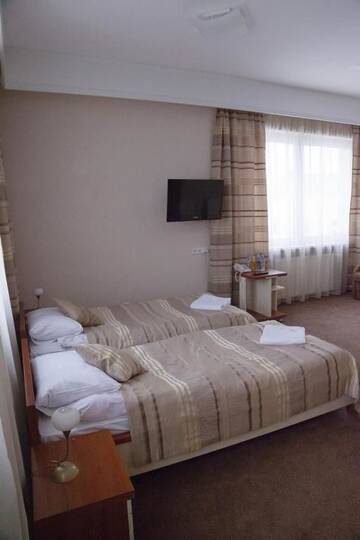 Фото номера Двухместный номер с 2 отдельными кроватями Отель Hotel &amp; SPA Odeon г. Boguchwała 12