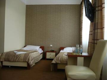 Фото номера Двухместный номер с 2 отдельными кроватями Отель Hotel &amp; SPA Odeon г. Boguchwała 4